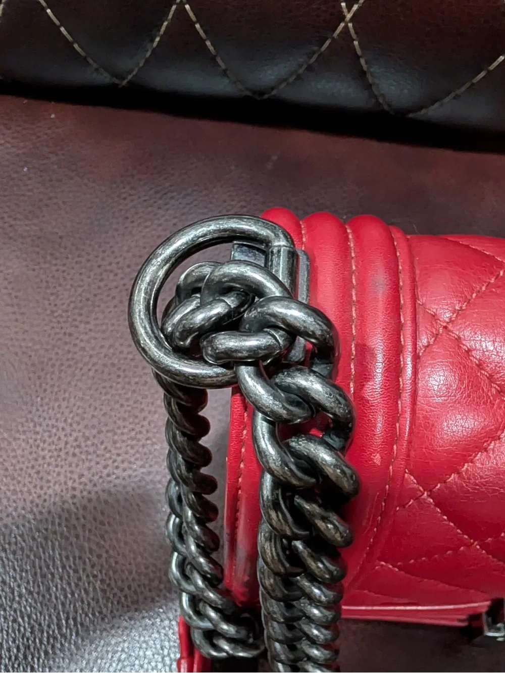 CHANEL Red leather small Boy with gunmetal tone chain